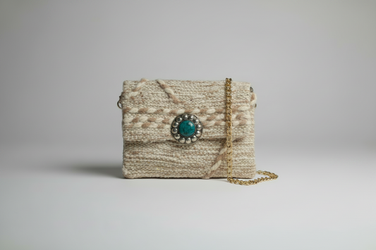Amal Clutch front view — handmade Berber clutch textured with turqoise stone clasp by Studio Palmier