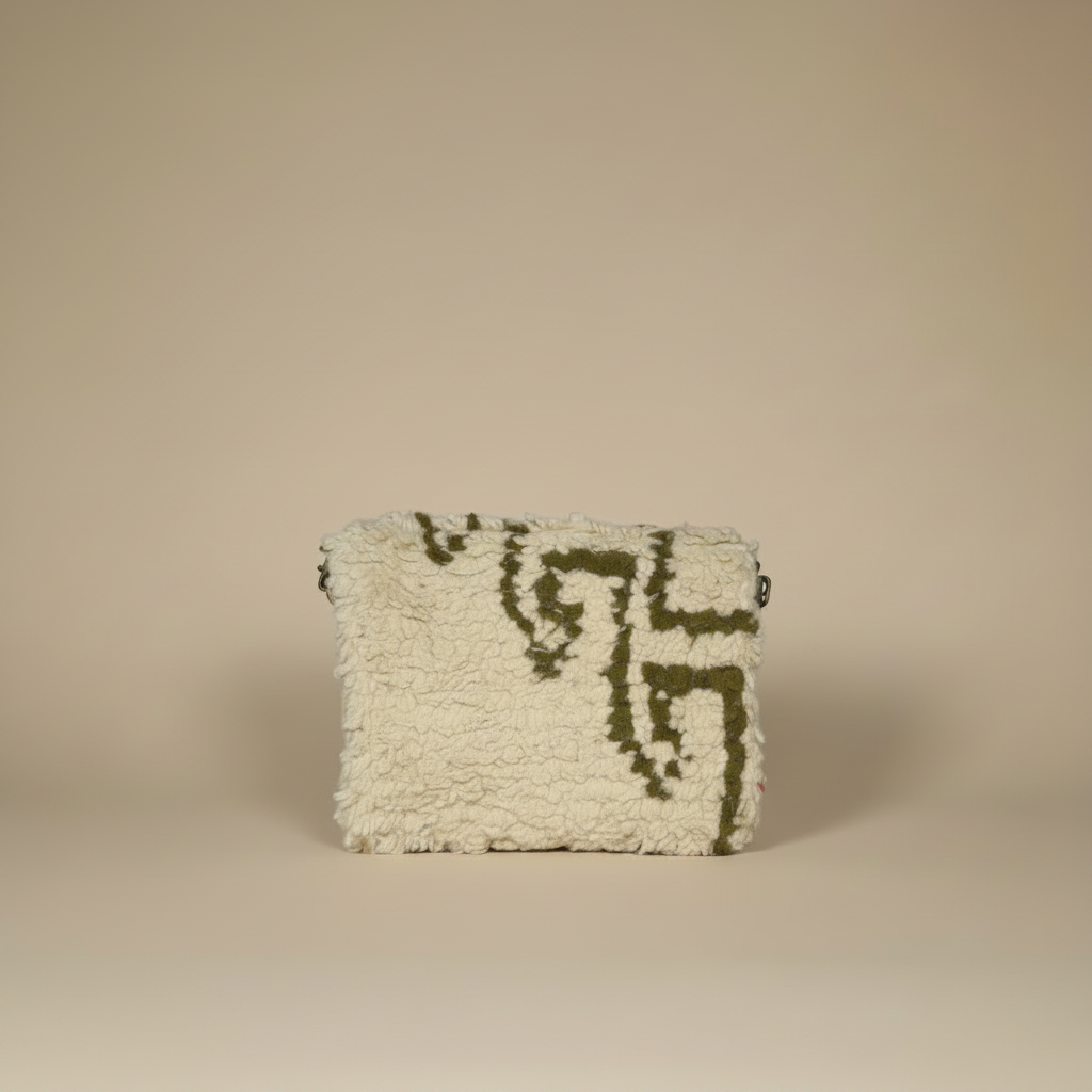 Darija Clutch back view — handmade Berber clutch with a geometric pattern by Studio Palmier