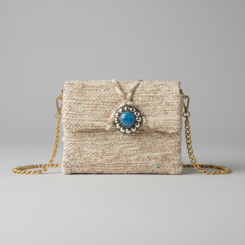 Zayn Clutch front view — handmade Berber clutch textured with beautiful blue stone clasp  by Studio Palmier